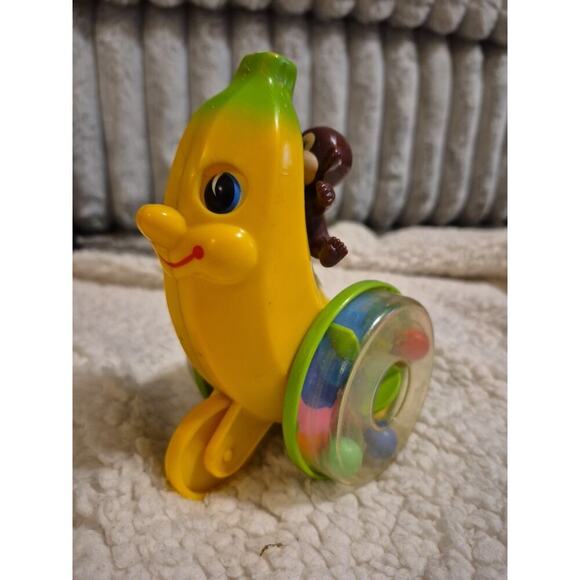 Vintage Long Running Wind-Arounds Pinky Monkey and His Giant Banana 1987 Childco - Picture 1 of 5